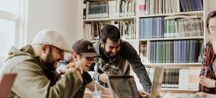 Group of guys hanging out in office adult pornography protection and digital wellness