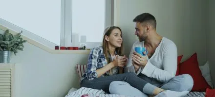 Young couple enjoying a conversation and coffee, learn empathy